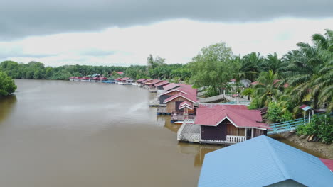 Drone-orbit-view-of-floating-houses-in-Rompin-Pahang,-Malaysia