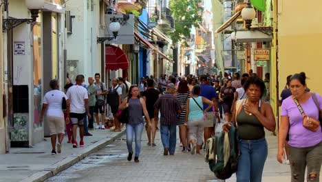 Walking-and-shopping-pedestrian-street-in-Havana,-Cuba