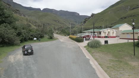 Motorbike-and-SUV-at-South-Africa-Sani-Pass-border-control-to-Lesotho