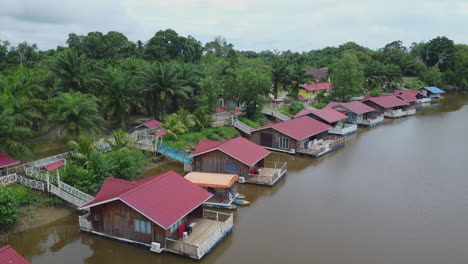 Drone-view-of-floating-houses-in-Rompin-Pahang,-Malaysia