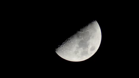 Half-a-moon-zoomed-in-at-night