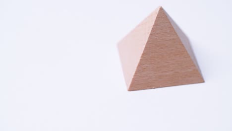 Pyramid-detail-rotating-on-white-background
