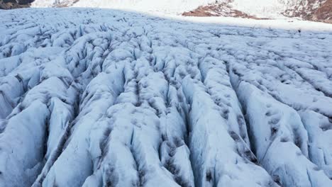 Ice-landscape-of-glacier-surface-in-arctic,-aerial