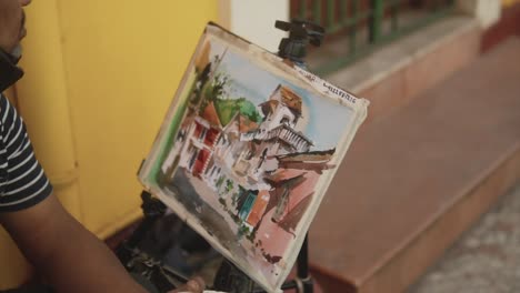 Slow-motion-clip-of-a-street-artist-painting