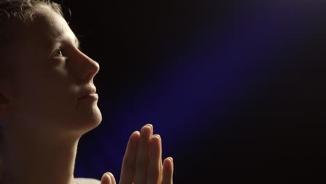 Close-up-view-of-a-woman-praying--Woman-meditating