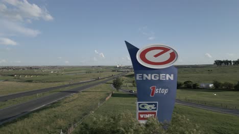 Commercial-truck-traffic-pulling-off-highway-into-Engen-petrol-station