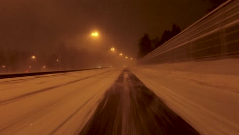POV-shot-traveling-along-a-track-cleared-on-the-highway-in-Helsinki