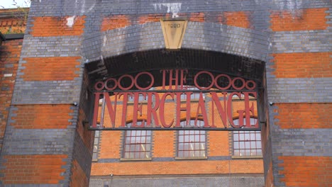 The-Interchange-Sign-Over-The-Entrance-Of-The-Brick-Building-At-Camden-Lock-In-London,-England,-UK