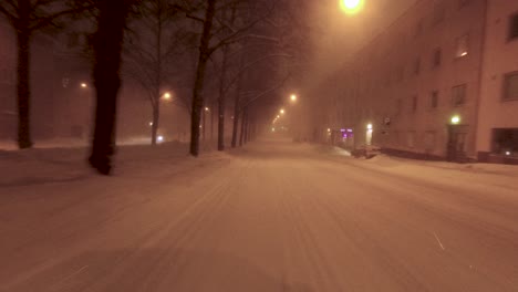 POV-shot-traveling-through-thick-snowfall-in-downtown-Helsinki-with-a-fresh-snowfall