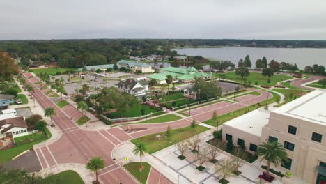 Aerial-flyover-of-the-charming-and-quaint-city-of-Ocoee-town-hall-in-Central-Florida-and-Starke-Lake