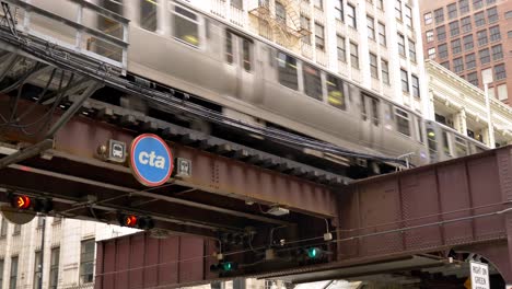 CTA-elevated-subway-train-passes-overhead-Chicago-Day