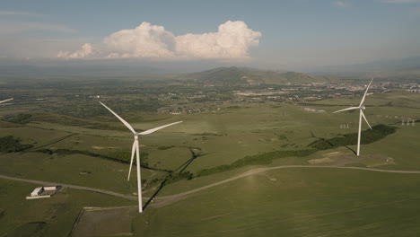 Turbine-generators-in-wind-in-agricultural-area-in-Gori,-Georgia