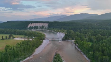 Panorama-Of-North-Fork-Flathead-River,-Blankenship-Bridge,-Mountain-And-Forest-At-Sunrise