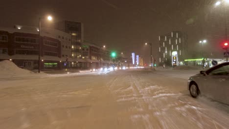 POV-shot-driving-through-downtown-Helsinki-with-Christmas-lights