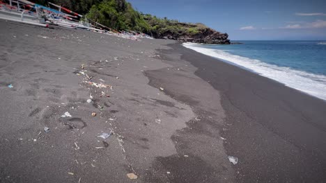 Walking-On-The-Polluted-Sandy-Shore-Of-Bali-Beach-In-Indonesia