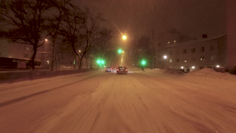POV-driving-shot-of-downtown-Helsinki-in-a-heavy-snowstorm