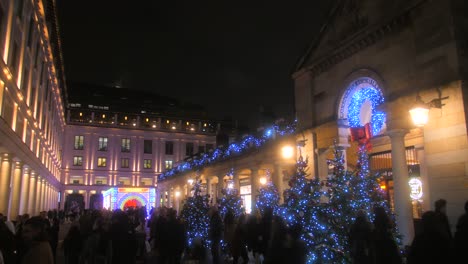 Entrance-to-Covent-Garden-Market-covered-in-Christmas-trees-and-decorations
