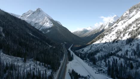 A-Winter-Wonderland-of-Majestic-Rocky-Mountains-and-Snowy-Forests,-Captured-from-Above-close-to-n-Revelstoke,-British-Columbia