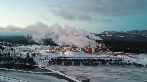 Cold-Morning-at-Pulp-Mill-in-Cranbrook,-British-Columbia:-Aerial-View-of-Industrial-Facility-and-Specialized-Machinery-Processing-Raw-Materials-for-Paper-Production
