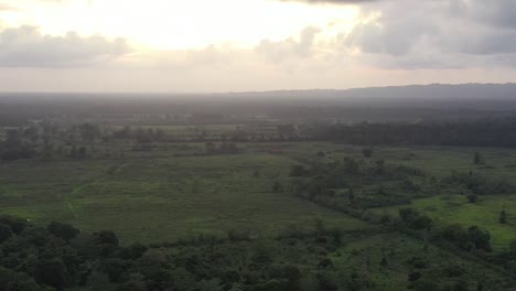 Plains-of-the-Tarcoles-river-basin-in-Costa-Rica,-Aerial-pan-right-shot