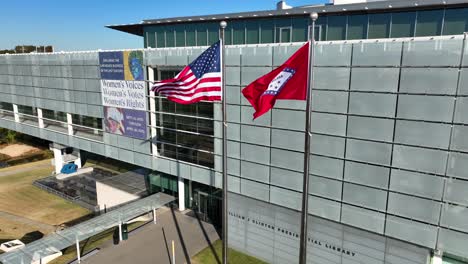William-J-Clinton-Presidential-Library-with-Arkansas-and-USA-flags