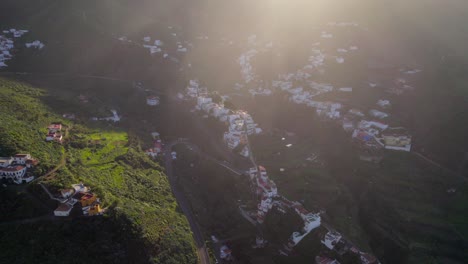 Aerial-View-Of-Remote-Coastal-Village-At-Taganana-bathed-In-Scenic-Sunlight