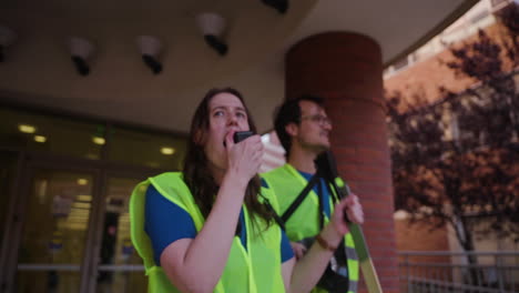 A-Young-Woman-Speaks-Passionately-into-a-Megaphone-to-a-Crowd-of-Workers-at-the-UC-Academic-Worker's-Strike-Picket-Line-in-UCLA