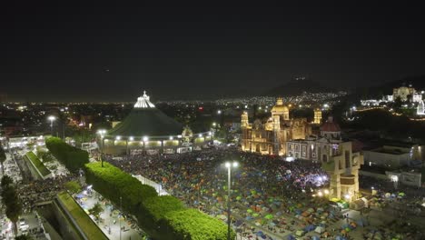 Pilgrim-camp-at-the-Basílica-de-Guadalupe,-Pilgrimage-Virgin-Day-night-in-Mexico---Aerial-view