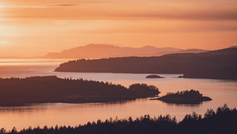 Timelapse-of-vivid-colours-of-a-warm-sunset-or-sunrise-of-islands-and-oceans-in-Bowen-Island,-British-Columbia,-Canada