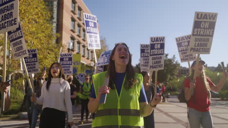 A-Young-Woman-Strike-Leader-Leads-a-Long-Picket-Line-of-UC-Academic-Workers-on-UCLA's-Campus