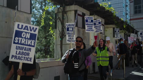 A-Long-Line-of-Academic-Workers-March-and-Cheer-on-the-Picket-Line-at-UCLA-for-the-Strike