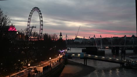 Stunning-view-of-the-London-Eye,-Big-Ben-and-the-Houses-of-Parliament-from-Waterloo-Bridge-in-the-Evening,-London,-United-Kingdom