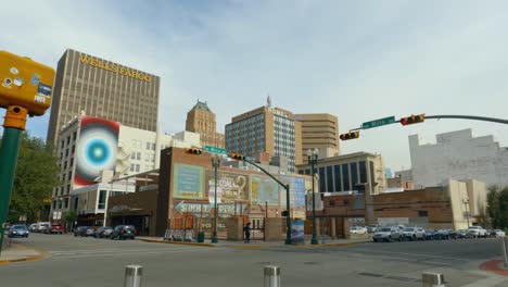 Large-White-Truck-Driving-Through-Intersection-In-Downtown-El-Paso-Texas-City-Area-Revealing-Urban-City-High-Rise-Buildings