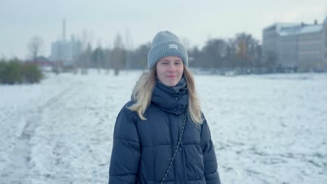 A-beautiful-woman-walking-away-from-camera-in-husky-snow-Siberia