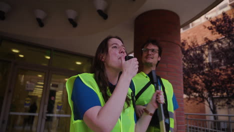 A-Young-Woman-Speaks-Passionately-into-a-Megaphone-at-the-UC-Academic-Worker's-Strike-Picket-Line-in-UCLA