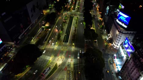 Aerial-view-of-nighttime-traffic-on-the-world's-largest-avenue-in-Buenos-Aires,-argentina