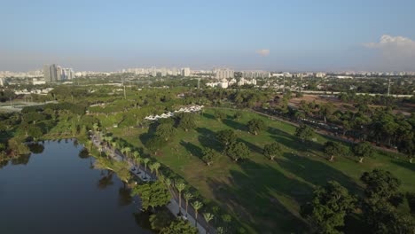 Parallax-over-the-giant-lawns-the-lake-in-Ramat-Gan-National-Park,-Israel-#007