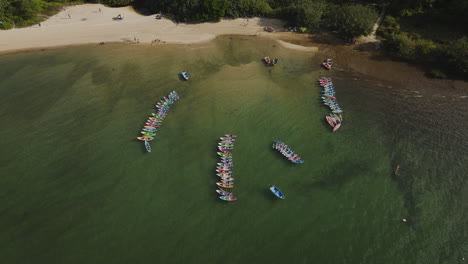 Orbit-drone-view-of-traditional-Boats-on-the-waters-in-Hong-Kong,-China