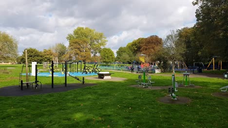 Playground-facilities-and-exercise-equipment-in-Southall-Recreation-Ground,-Southall,-Middlesex