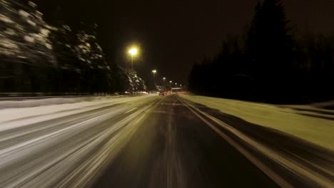 POV-shot-traveling-along-a-cleared-highway-in-Helsinki
