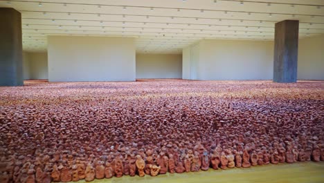 Asian-Field-by-Antony-Gormley-–-the-sea-of-faces,-Exhibition-in-M-Plus-Museum