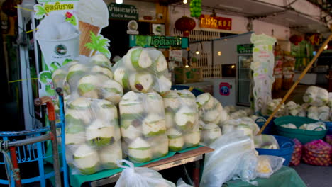 Fresh-peeled-green-coconut-stored-in-plastic-bags-ready-to-be-prepared-into-drinks-and-desserts