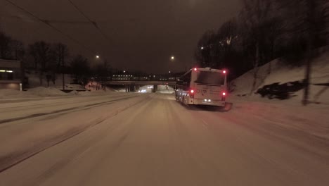 POV-shot-driving-along-a-small-street-and-then-stopping-at-lights-in-Helsinki