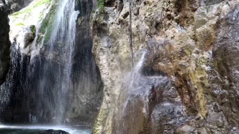 Small-erosional-cave-created-by-Engaresero-waterfall-in-Tanzania,-Africa