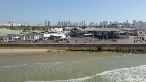 Slide-over-the-Tel-Aviv-Port-Promenade-and-then-you-see-the-city's-skyline-in-the-background-#014