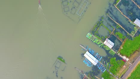 Overhead-drone-view-of-fish-cage-on-the-Rawa-Pening-lake,-Semarang,-Indonesia
