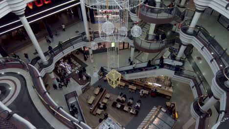 17-December-2022---Looking-Down-Below-To-Other-Floors-And-Food-Court-To-Ground-Level-In-St-Georges-In-Harrow-During-Christmas-Period