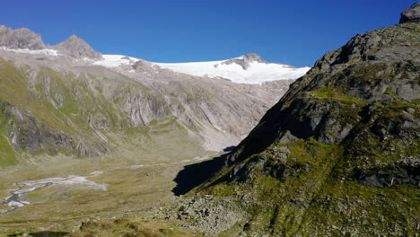 Aerial-view-orbiting-epic-Hinterlux-glacier-Tux-valley-Austrian-mountain-range
