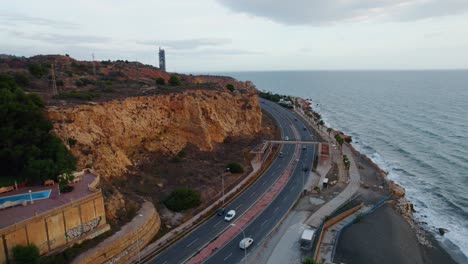 Forward-cinematic-drone-shot-above-costal-road-in-candado,-Malaga-Spain