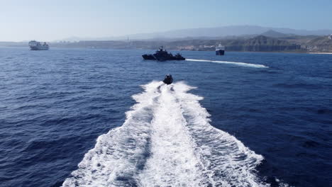 Fantastic-aerial-shot-from-the-stern-of-a-high-speed-boat-of-the-National-Customs-Police-and-in-the-direction-of-the-patrol-boat